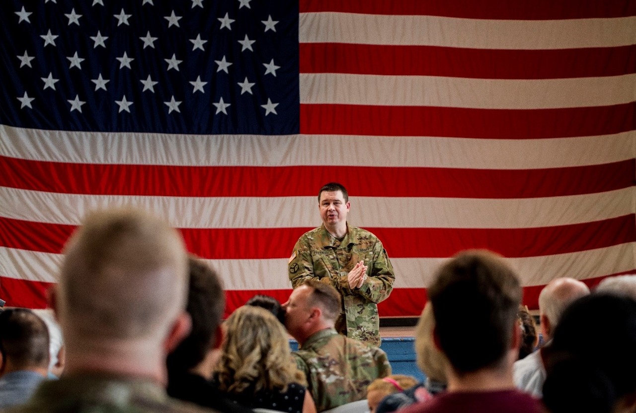 Maj. Danny Frederick, commander of the 1957th Contingency Contracting Team, speaks at a farewell ceremony, June 22, which took place at Nashville’s Joint Force Headquarters. The 1957th will complete pre-deployment requirements in Fort Bliss, Texas, before leaving for a nine-month deployment to the Horn of Africa. (Photo by 1st Lt. Sarah Kohrt) Maj. Danny Frederick, commander of the 1957th Contingency Contracting Team, speaks at a farewell ceremony, June 22, which took place at Nashville’s Joint Force Headquarters. The 1957th will complete pre-deployment requirements in Fort Bliss, Texas, before leaving for a nine-month deployment to the Horn of Africa. (Photo by 1st Lt. Sarah Kohrt)