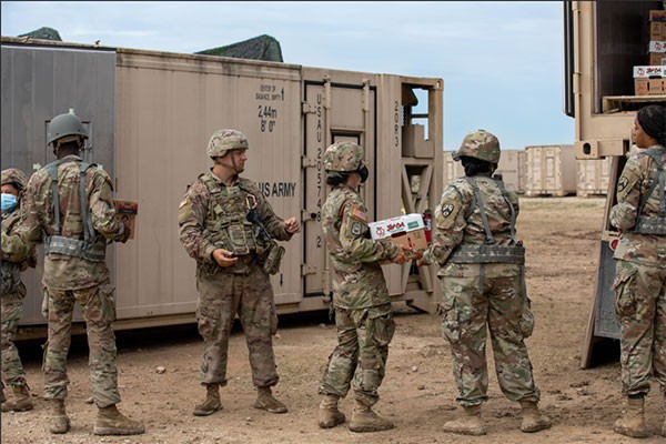 Soldiers from the 230th Sustainment Brigade work together to organize critical supplies required to support all Tennessee Guardsmen in Fort Hood, Texas, as they conduct an eXportable Combat Training Capability exercise throughout the month of July. (Photo by Pfc. Everett Babbitt)