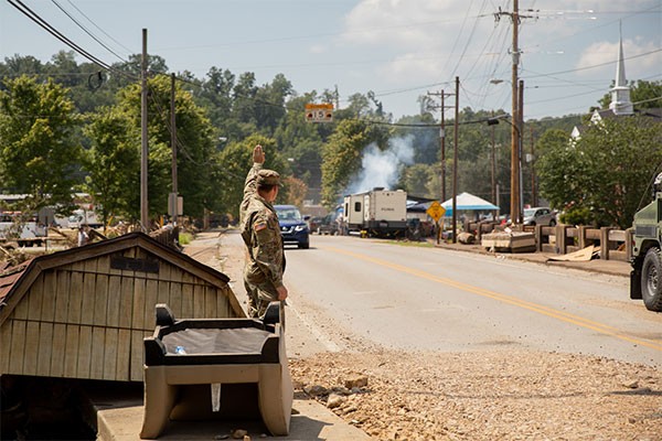 Soldiers from the Tennessee National Guard conduct traffic control operations in Waverly, Aug. 25, following deadly flooding last weekend. More than 80 members of the Tennessee National Guard are in Humphreys County working with state, county, and local emergency personnel, as well as the Tennessee Emergency Management Agency, assisting with traffic control, security, supply distribution, and cleanup operations in the impacted area. (Photo by Sgt. 1st Class Timothy Cordeiro)