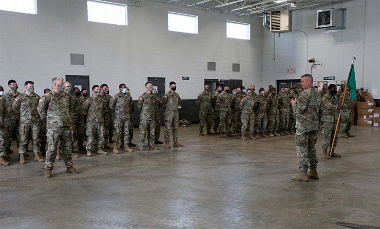 Tennessee's Adjutant General, Maj. Gen. Jeff Holmes, talks with Soldiers from Millington’s 268th Military Police Company as they prepare for a yearlong deployment overseas. More than 80 Soldiers from the 268th departed for Fort Bliss, Texas, on Jan. 10, to complete final mobilization training before traveling to the Horn of Africa in support of U.S. Africa Command. (photo by Staff Sgt. Mathieu Perry)