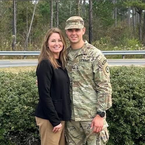 Staff Sgt. William Lukens, an infantryman with the Tennessee National Guard’s 278th Armored Cavalry Regiment, poses for a photo with his mother, Liz Lukens, Dec. 9, at his U.S. Army Ranger School graduation, at Fort Benning, Ga. (submitted photo)