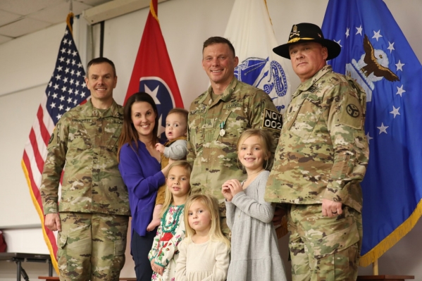 Sgt. Zachary Kleinfelder, a member of the 278th Armored Cavalry Regiment, poses for a photograph with his family and senior NCOs with the Tennessee National Guard after being selected as Tennessee’s 2022 Noncommissioned Officer of the Year on Feb. 27. (Photo by Sgt. Finis Dailey)