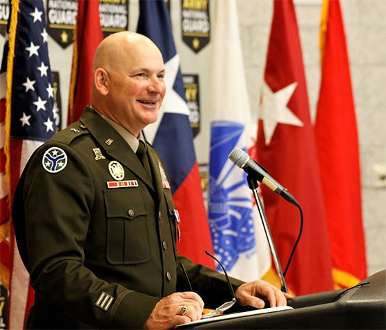 Brig. Gen. John “Brad” Bowlin speaks to the attendees during his promotion ceremony at the Mt. Carmel National Guard Armory, March 6. (photo by Staff Sgt. Mathieu Perry)