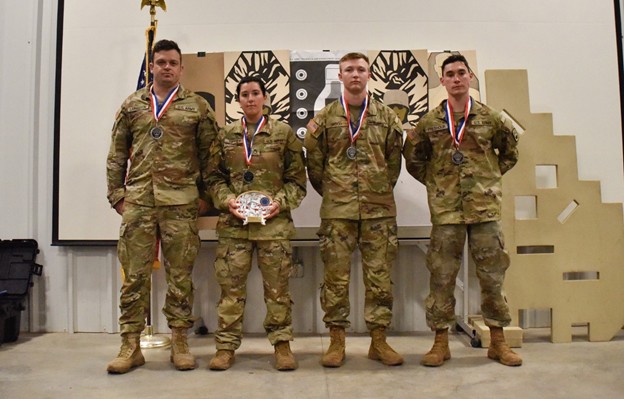 Staff Sgt. Celia Riffey poses with her teammates from the 252nd Military Police Company after they came in second place at the annual Adjutant General Match, which took place at Tullahoma’s Volunteer Training Site, from May 20-22. The TAG Match is a marksmanship competition and training event to promote shooting proficiency throughout the ranks of the Tennessee National Guard. (photo by Sgt. 1st Class Timothy Cordeiro)