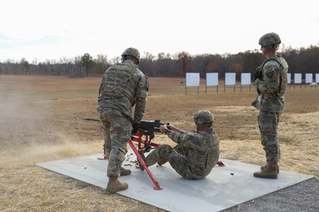 Lt. Col. Thomas J. Foley, Tennessee National Guard’s Deputy Operations and Training Officer, is one of the inaugural firers of the .50-caliber Browning machine gun, at a ceremony held Nov. 15, at Tullahoma’s Volunteer Training Site. New analysis and range modifications now allow the .50-cal to be fired at Tullahoma’s machine gun range, which marks the first time the weapon is fired at a Tennessee National Guard training site. (photo by Sgt. 1st Class Timothy Cordeiro)