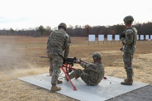 Lt. Col. Thomas J. Foley, Tennessee National Guard’s Deputy Operations and Training Officer, is one of the inaugural firers of the .50-caliber Browning machine gun, at a ceremony held Nov. 15, at Tullahoma’s Volunteer Training Site. New analysis and range modifications now allow the .50-cal to be fired at Tullahoma’s machine gun range, which marks the first time the weapon is fired at a Tennessee National Guard training site. (photo by Sgt. 1st Class Timothy Cordeiro) Lt. Col. Thomas J. Foley, Tennessee National Guard’s Deputy Operations and Training Officer, is one of the inaugural firers of the .50-caliber Browning machine gun, at a ceremony held Nov. 15, at Tullahoma’s Volunteer Training Site. New analysis and range modifications now allow the .50-cal to be fired at Tullahoma’s machine gun range, which marks the first time the weapon is fired at a Tennessee National Guard training site. (photo by Sgt. 1st Class Timothy Cordeiro)