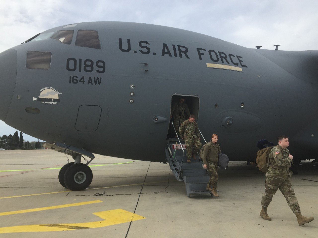 An Air National Guard C-17 Globemaster from the 164th Airlift Wing offloads Tennessee Army National Guard Soldiers in Bulgaria as part of a multinational exercise. (Photo courtesy of the Tennessee National Guard)