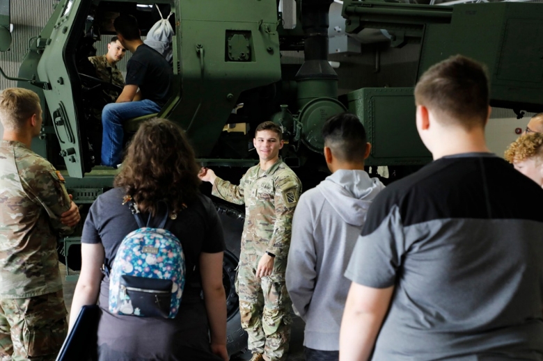 Sgt. Gage Boggess with Chattanooga’s 1-181st Field Artillery Regiment briefs Coffee County Central and Tullahoma High School students on the M-ATV, or Mine-resistant ambush protected All-Terrain Vehicle, during a career day at the Tullahoma National Guard Armory on April 6. (photo by Lt. Col. Marty Malone) Sgt. Gage Boggess with Chattanooga’s 1-181st Field Artillery Regiment briefs Coffee County Central and Tullahoma High School students on the M-ATV, or Mine-resistant ambush protected All-Terrain Vehicle, during a career day at the Tullahoma National Guard Armory on April 6. (photo by Lt. Col. Marty Malone)