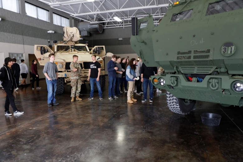 Students from Coffee County Central and Tullahoma High Schools tour a HIMARS, or High Mobility Artillery Rocket System, and an M-ATV, or Mine-resistant ambush protected All-Terrain Vehicle, during a career day at the Tullahoma National Guard Armory on April 6. (photo by Lt. Col. Marty Malone) Students from Coffee County Central and Tullahoma High Schools tour a HIMARS, or High Mobility Artillery Rocket System, and an M-ATV, or Mine-resistant ambush protected All-Terrain Vehicle, during a career day at the Tullahoma National Guard Armory on April 6. (photo by Lt. Col. Marty Malone)