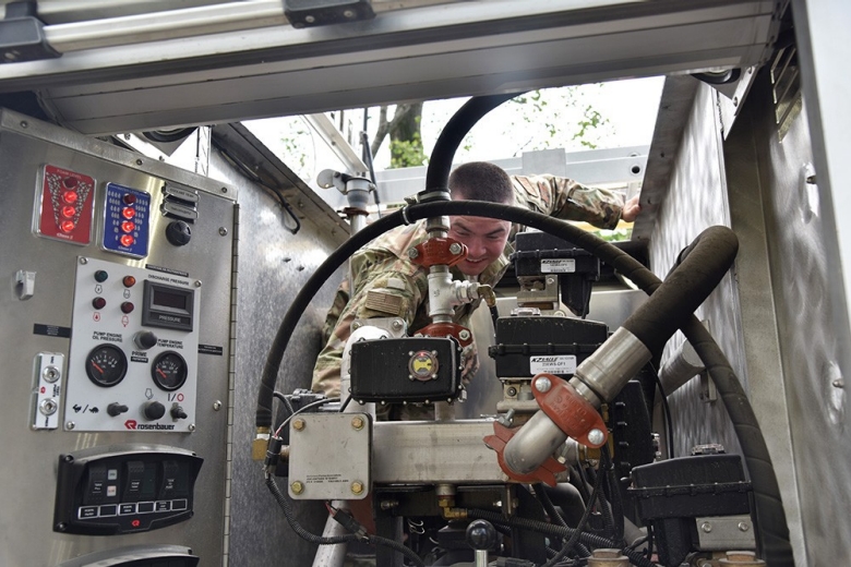 Airman First Class Andrew Davis performs preventative maintenance on a fire truck at Graf Air Base in Plovdiv, Bulgaria on June 13 at Graf Air Base in Plovdiv, Bulgaria.