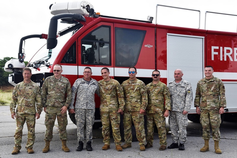 Tennessee Air National Guard firefighters and the Bulgarian Air Force firefighters pose together as part of Falcon Defender and Thracian Sentry 23 on June 13 at Graf Air Base in Plovdiv, Bulgaria.