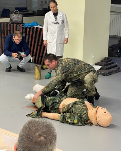 Medical professionals look on as a soldier tests for Combat Paramedic certification on June 13 in Sofia, Bulgaria. (photo by TSgt Dawn McCall)