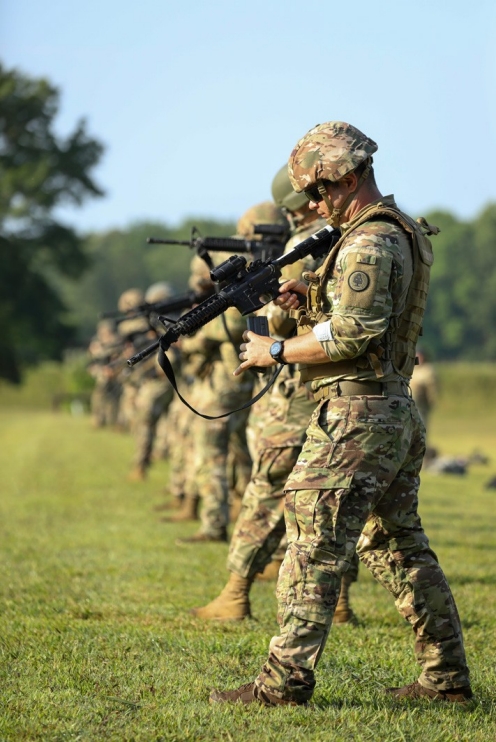 Soldiers and Airmen of the Tennessee National Guard prepare to shoot their rifles during the Tennessee Adjutant General’s Rifle Match, held at Tullahoma’s Volunteer Training Site, June 23-25. The TAG Match is a marksmanship competition and training event to promote shooting proficiency throughout the ranks of the Tennessee National Guard. (photo by Sgt. James Bolen Jr.)