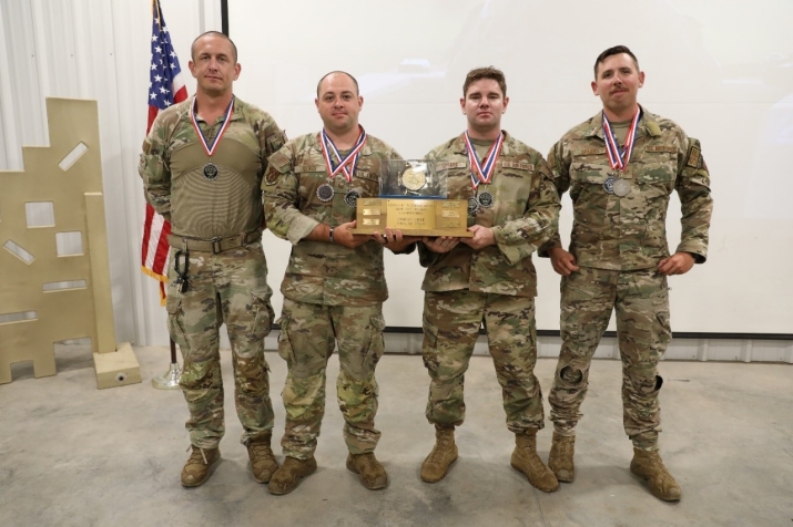 Staff Sgt. Darrell Spears poses with his teammates from Nashville’s 118th Wing after winning first place at the annual Adjutant General’s Rifle Match, which took place at Tullahoma’s Volunteer Training Site, June 23-25. The TAG Match is a marksmanship competition and training event to promote shooting proficiency throughout the ranks of the Tennessee National Guard. (photo by Sgt. James Bolen Jr.)