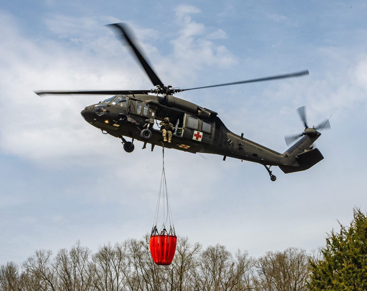 Photo of Tennessee National Guard UH-60 Blackhawk helicopter equipped with Bambi Bucket