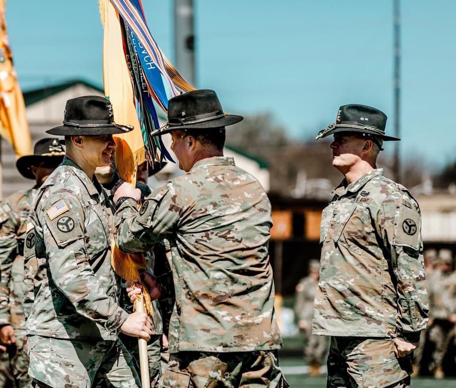 Col. Donny Hebel receives the unit colors from Brig. Gen. Steven Turner, Tennessee’s Assistant Adjutant General-Army, during the 278th Armored Cavalry Regiment’s change of command ceremony, March 10, at Knoxville’s West High School. (Photo by Staff Sgt. Art Guzman) Col. Donny Hebel receives the unit colors from Brig. Gen. Steven Turner, Tennessee’s Assistant Adjutant General-Army, during the 278th Armored Cavalry Regiment’s change of command ceremony, March 10, at Knoxville’s West High School. (Photo by Staff Sgt. Art Guzman)