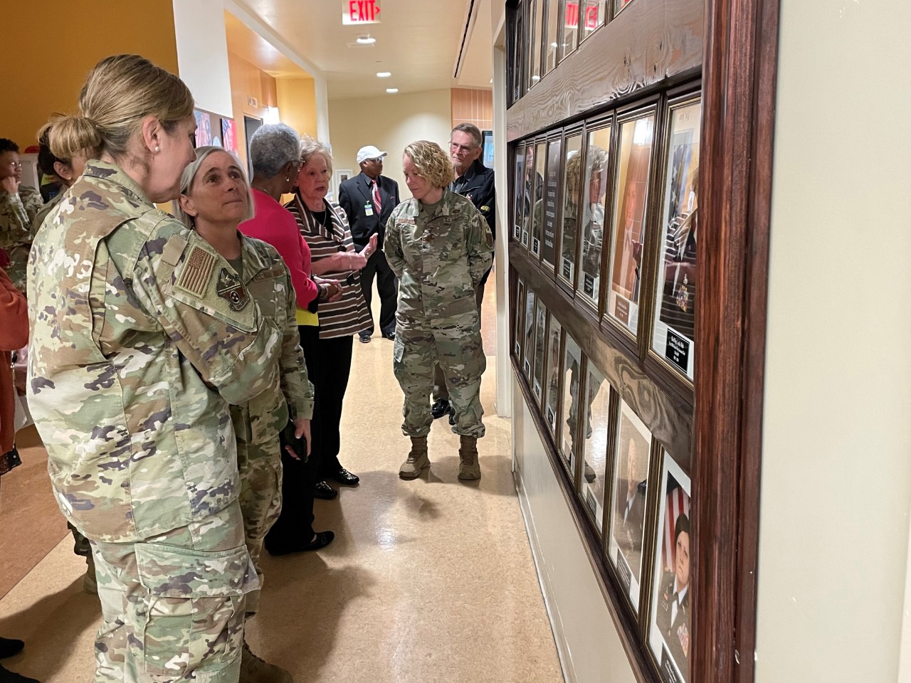 Members of the Tennessee National Guard check out the new Women's History Wall, March 28, at their Joint Force Headquarters, in Nashville. The wall features 23 women who paved the way by becoming the first females to achieve the respective positions in the Tennessee National Guard. (photo by Capt. Kealy Moriarty)