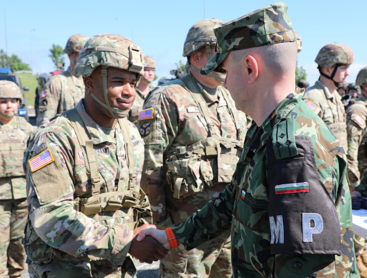 Capt. Eric Cheatham, operations officer for Athens’ 117th Military Police Battalion, meets Col. Dimitar Dimitrov, with the Bulgarian Military Police Force, during the opening ceremony for Beyond Horizon 2024, a multi-national training exercise held at Bulgaria’s Novo Selo Training Site, May 14. Nearly 20 Soldiers from Athens’ 117th Military Police Battalion and Murfreesboro’s 269th Military Police Company will train with more than 140 military policemen from Bulgaria, Canada, Greece, North Macedonia, and Romania during the nine-day exercise to improve multi-national teamwork and combat skills. (photo by Lt. Col. Darrin Haas)
