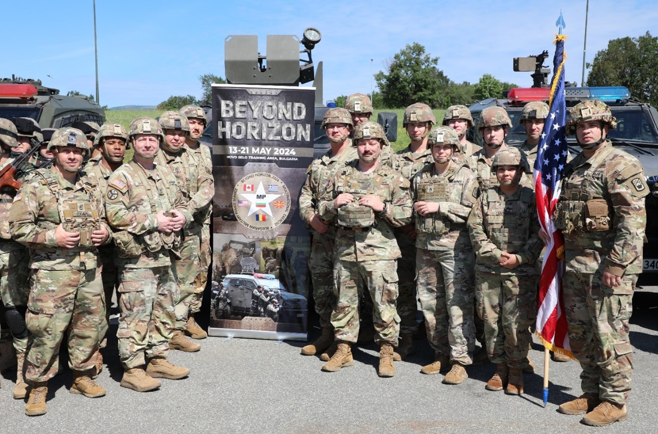 Tennessee Guardsmen from Athens’ 117th Military Police Battalion and Murfreesboro’s 269th Military Police Company pose for a group photograph following the opening ceremony for Beyond Horizon 2024, a multi-national training exercise held at Bulgaria’s Novo Selo Training Site, May 14. These Soldiers will train with more than 140 military policemen from Bulgaria, Canada, Greece, North Macedonia, and Romania during the nine-day exercise to improve multi-national teamwork and combat skills. (photo by Lt. Col. Darrin Haas)