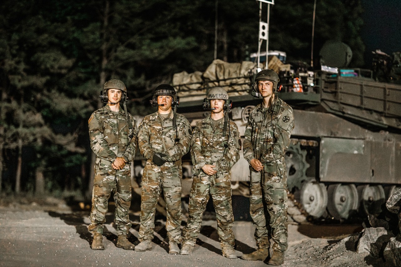 Four Soldiers from Ashland City’s Troop B, 1st Squadron, 278th Armored Cavalry Regiment, won first place during the prestigious 2024 Sullivan Cup competition at Fort Moore, Georgia, from April 29 to May 3. Staff Sgt. David Riddick, Sgt. Joshua Owen, Spc. Noah Eddings, and Spc. Seth Carter pose in front of their M1 Abrams while competing against 10 other teams from active-duty Army units and four different allied nations, in a head-to-head competition to test a crew's maneuver, sustainment, and gunnery skills to earn the honor of being the best tank crew.  (photo by Staff Sgt. Arturo Guzman) 