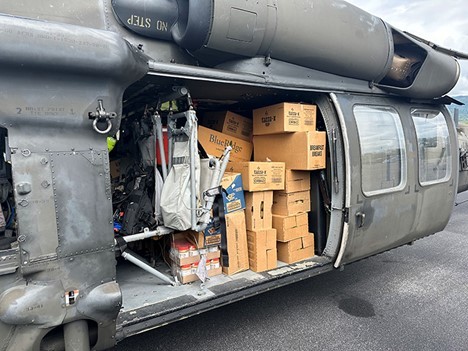 A Blackhawk helicopter from Knoxville’s 1-230th Assault Helicopter Battalion, prepares to transport supplies to those in need in East Tennessee, September 30. (submitted photo) 