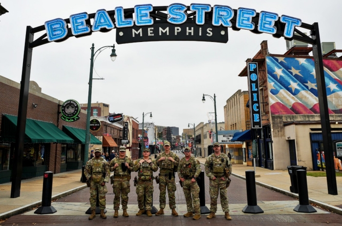 Staff Sgt. Cody Luhrs and his squad, comprised of both Tennessee National Guard Soldiers and Airmen, pose for a brief picture while conducting community safety patrols as part of the Memphis Safe Task Force. (Photo by U.S. Army Staff Sgt. Matthew Brown) Photo of Staff Sgt. Cody Luhrs and his squad while conducting community safety patrols as part of the Memphis Safe Task Force. (Photo by U.S. Army Staff Sgt. Matthew Brown)