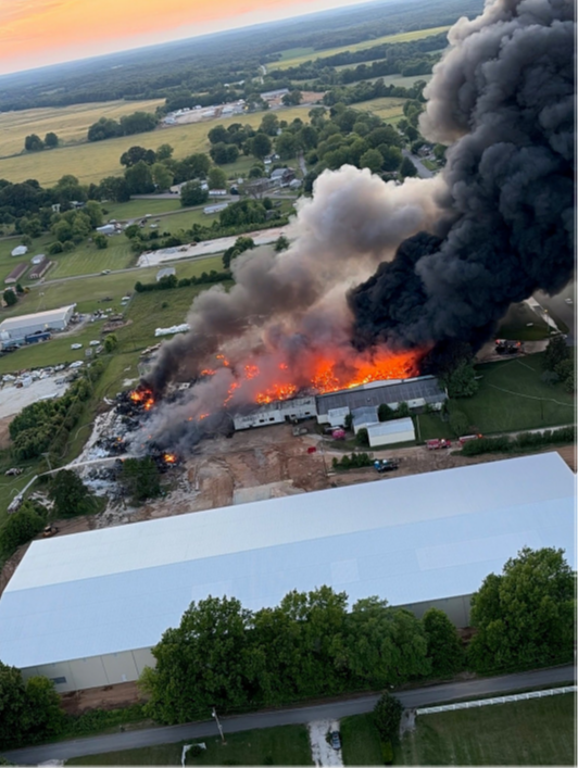 At the request of the Tennessee Emergency Management Agency, a Tennessee Army National Guard UH-60V Blackhawk helicopter with the 1-230th Assault Helicopter Battalion, based in Jackson, supported firefighters battling an industrial fire at the Sigma Renew 360 plant in Henry County, May 8. (Courtesy Photo) At the request of the Tennessee Emergency Management Agency, a Tennessee Army National Guard UH-60V Blackhawk helicopter with the 1-230th Assault Helicopter Battalion, based in Jackson, supported firefighters battling an industrial fire at the Sigma Renew 360 plant in Henry County, May 8. (Courtesy Photo)