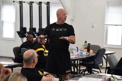 Image of Sgt. Ken Weichert instructing Soldiers in a classroom setting