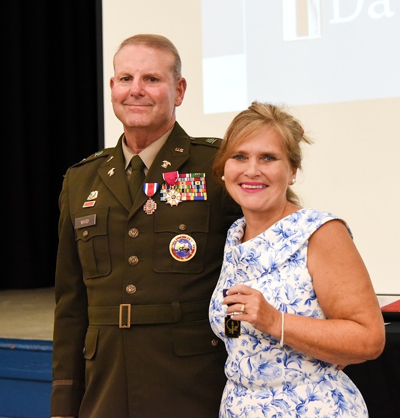Chief Warrant Officer 5 David Ward and his wife, Jennifer, celebrate Ward’s retirement from the Tennessee Army National Guard after 40 years of military service during his retirement ceremony at Nashville’s Joint Force Headquarters, August 28. (photo by retired Sgt. 1st Class Edgar Castro)