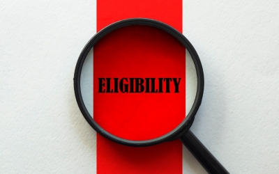 magnifying glass over the word eligibility