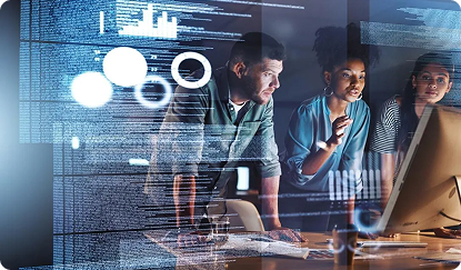 Photo of three coworkers looking at a computer with a data dashboard