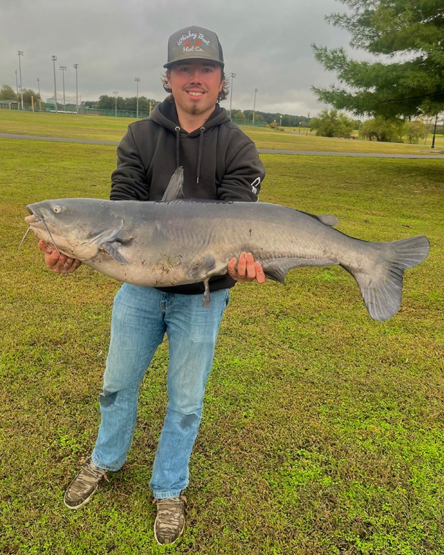 Mason Baker shows a 40.50” Blue Catfish caught in Martin City Pond Tennessee 