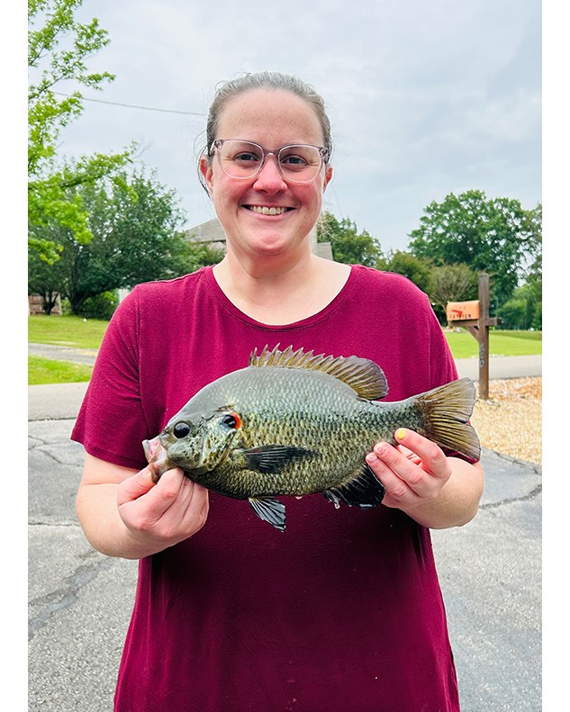 Miranda Fly displays a 12.25”  Redear Sunfish caught in Kentucky Lake TN