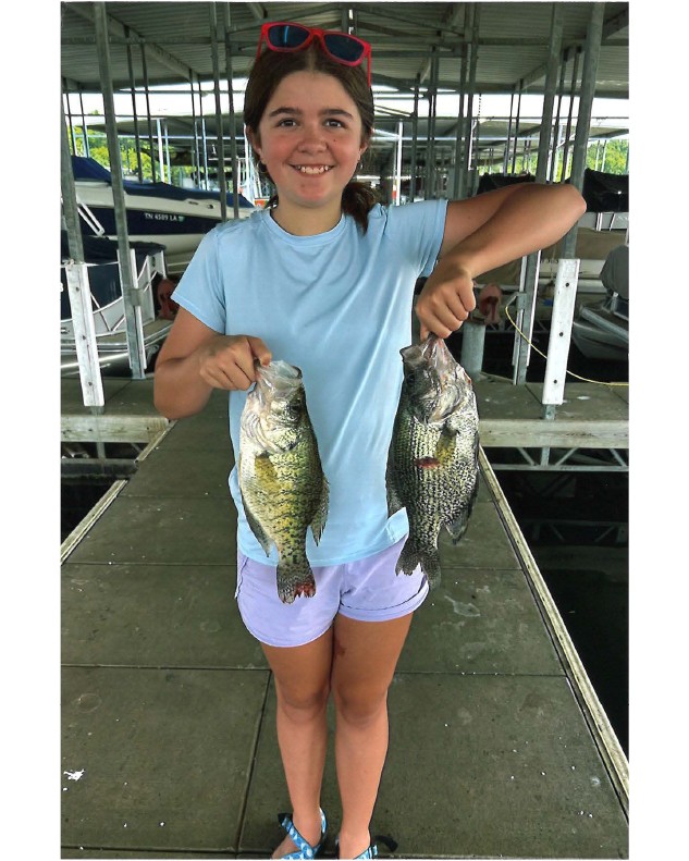 Avery Foster is showing  Black and White Crappie 14” caught at Percy Priest Reservoir, in Tennessee