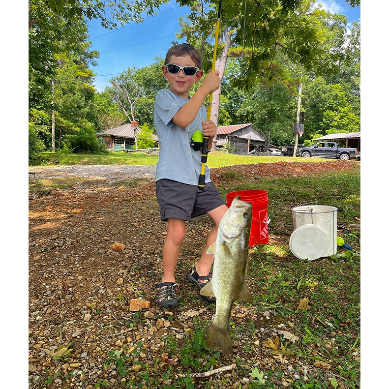 Michael Francis Simpson shows a Largemouth Bass caught at Lever Lake, in Fairview, TN on July 11, 2025.