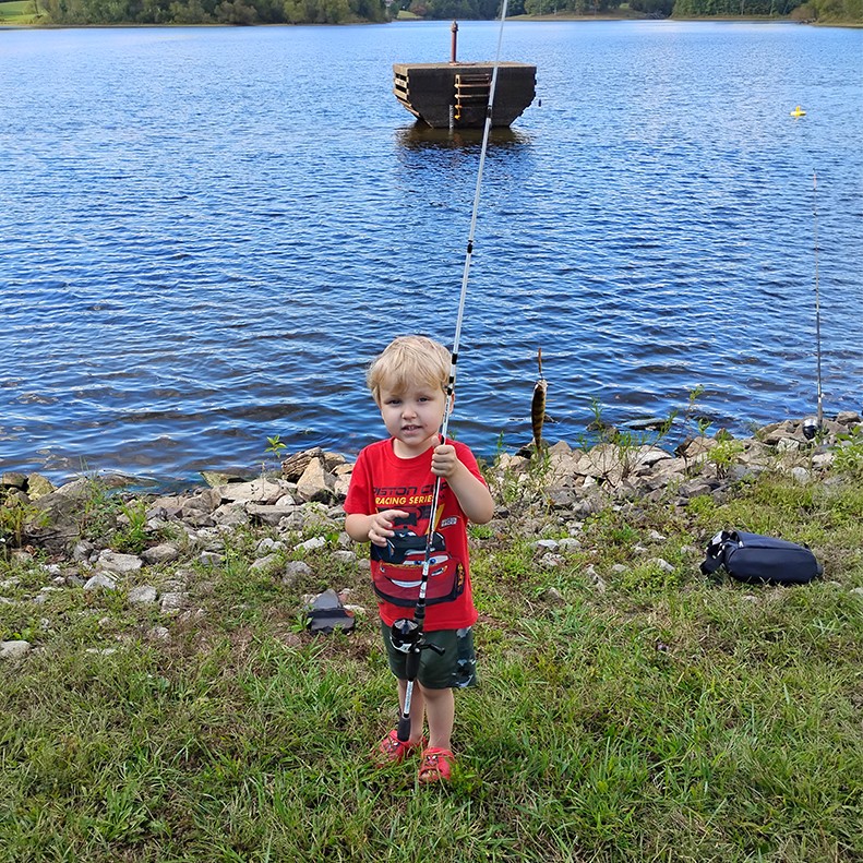 Luke Massengale shows a Yellow Perch caught at Watershed Lake in Oneida TN, on September 27, 2025.
