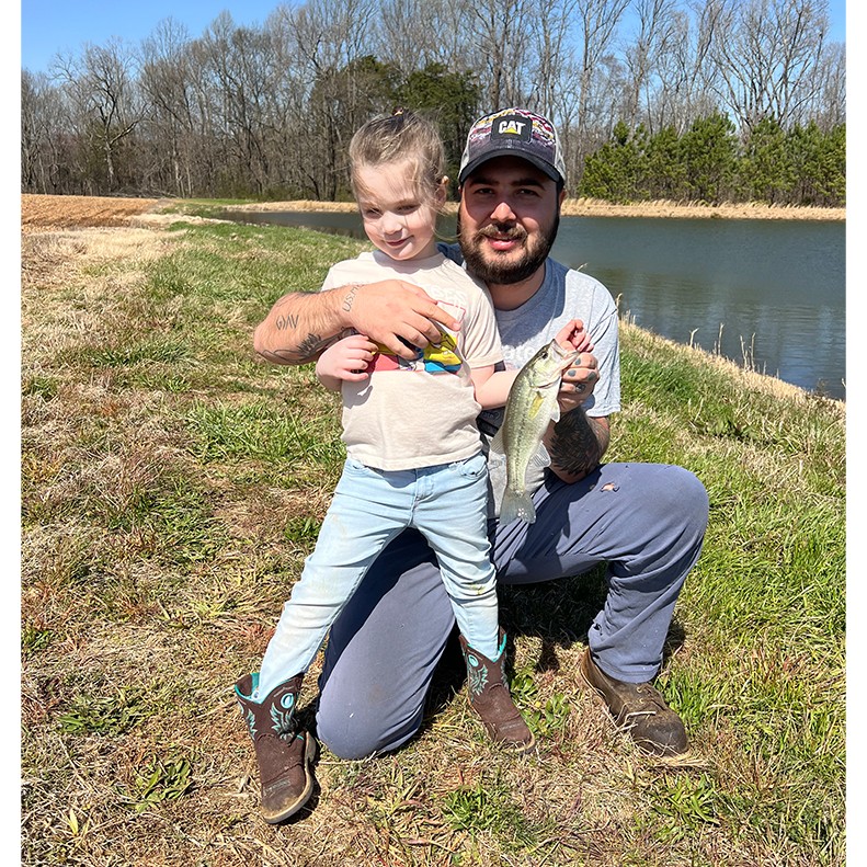 Raven Robinson shows a Largemouth Bass caught in Franklin TN, on March 23, 2025.