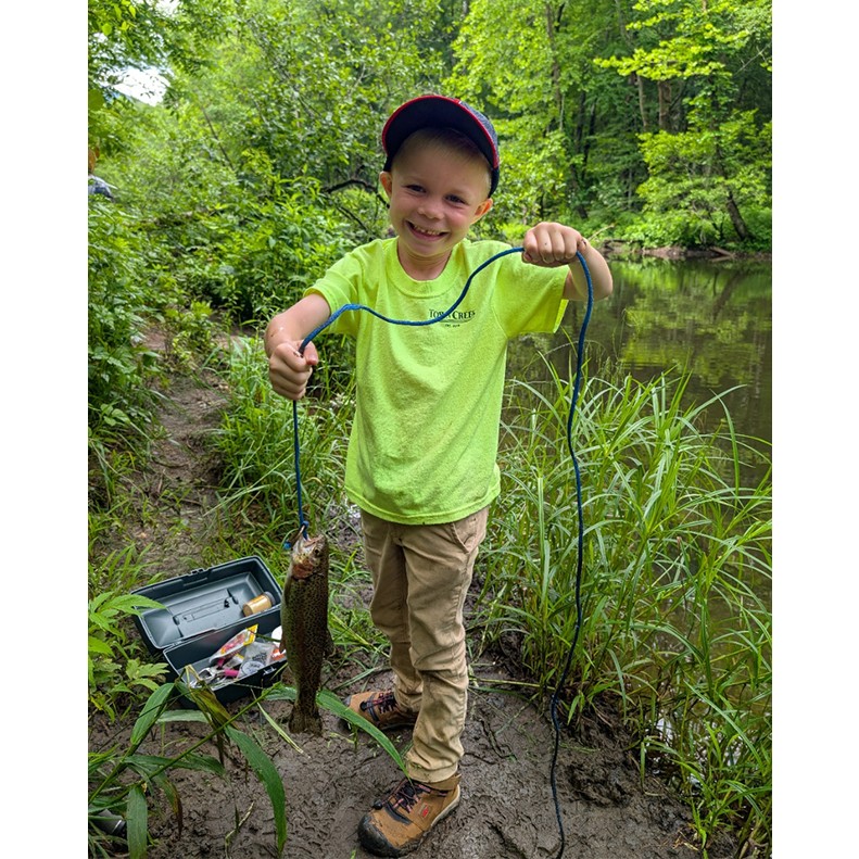 Beau Blanton shows a Rainbow Trout caught at Tellico Plains TN on June 07, 2025.
