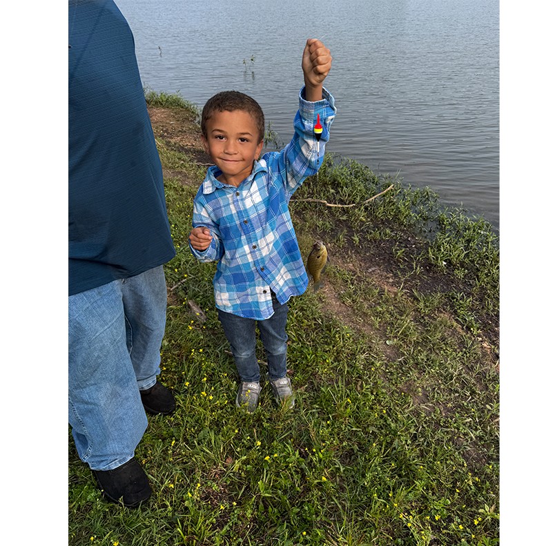 Ajani Jones holds up a Bluegill caught at Cross Creek, Dover, Tennessee on May 31, 2025.