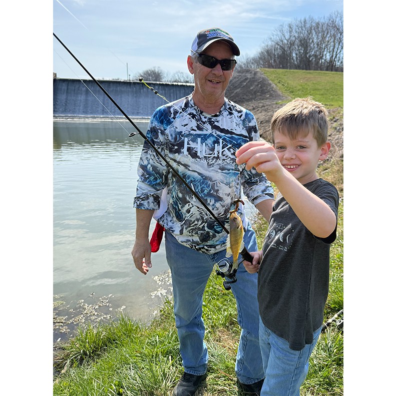 Boone Callis shows a caught Bluegill in Livingston City Lake, TN, on March 20, 2026.