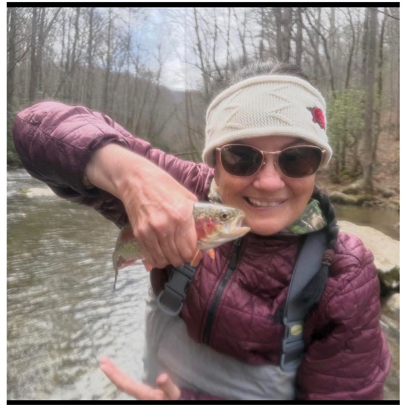 Monica J Harris shows a Rainbow Trout caught on February 18, 2026.