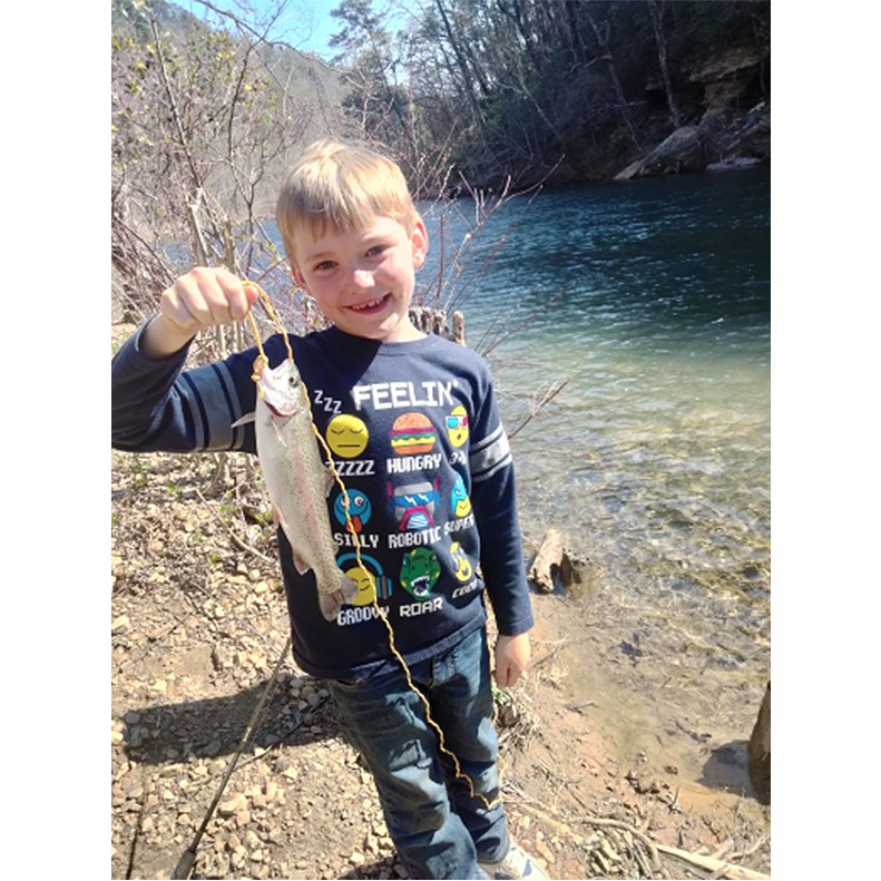 Alexander Leonard shows a Rainbow Trout caught on March 22, 2026.