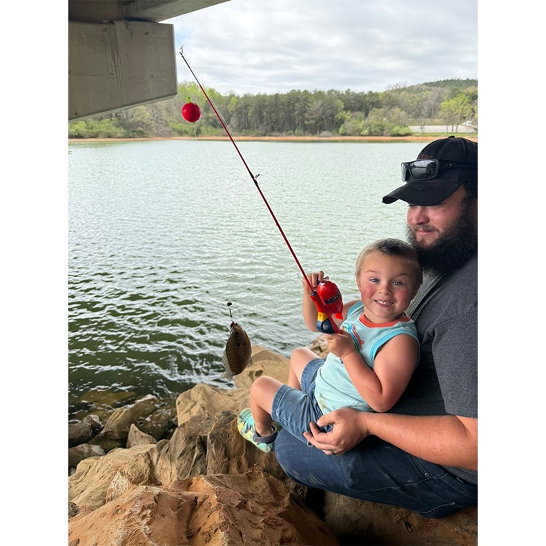 Brandon Martin shoes a Bluegill caught on March 30, 2026.