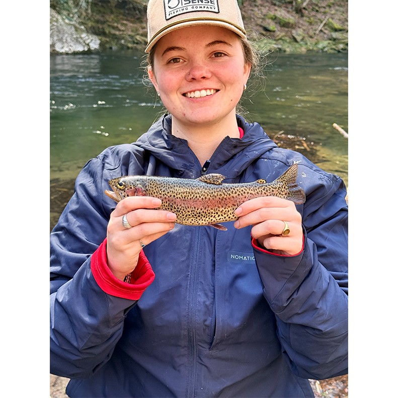 Madison Harris shows a Rainbow Trout caught on March 14, 2026.