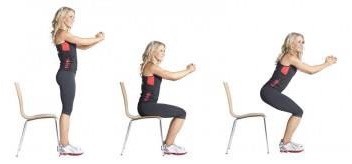 A series of three photos in which a woman is doing a chair squat. In the first image, she's standing in front of the chair. In the second image, she's sitting in the chair. In the third image, she's starting to emerge from the chair. A series of three photos in which a woman is doing a chair squat. In the first image, she's standing in front of the chair. In the second image, she's sitting in the chair. In the third image, she's starting to emerge from the chair.