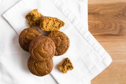 pumpkin breakfast muffins on a white napkin