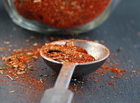 seasoning blend in a small measuring spoon