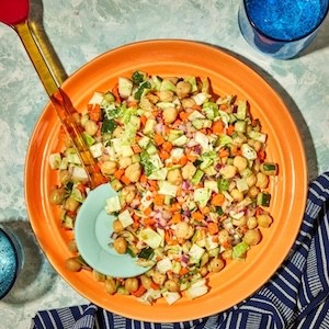 crunchy chopped salad in a yellow bowl