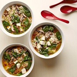 three bowls of tofu ramen soup with spinach 