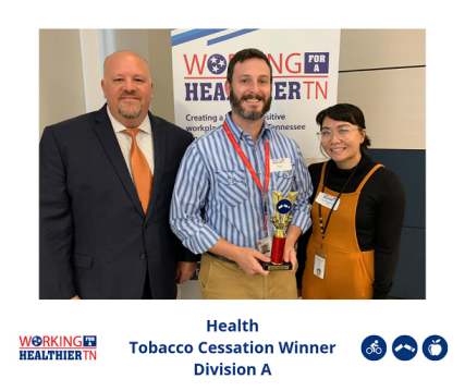 Health's Wellness Council accepts award for Tobacco Cessation.